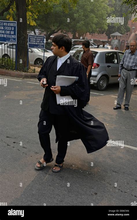 An Indian Lawyer At The Main Entrance To The Supreme Court Of India In