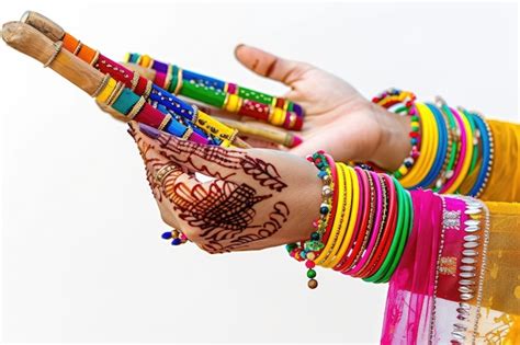 Energetic Movements Hands Performing Dandiya Raas Isolated on White | Premium AI-generated image