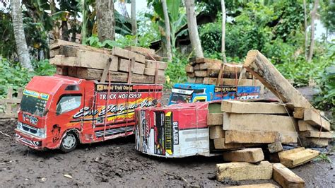 TERLALU NEKATMOBIL TRUK OLENG MAINAN BERMUATAN KAYU BALOK OVER LOAD