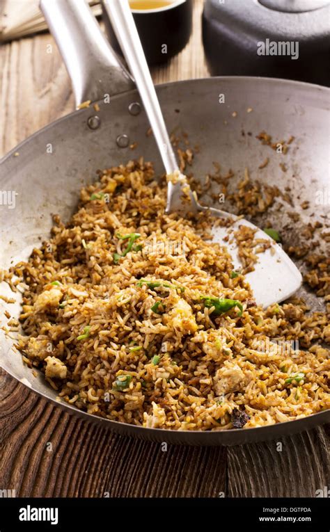 fried rice in wok Stock Photo - Alamy