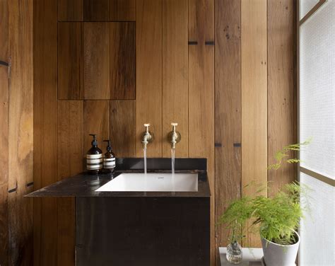 A Japanese Style Two Room Bath Filled With Hanging Plants