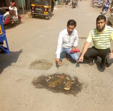 Citizens Ensure Environmental Safety By Filling Potholes In Mumbai