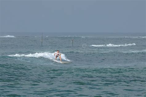 Surfing The Waves Of Koggala Beach In Sri Lanka Editorial Photography