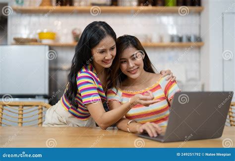 Happy Lesbian Lgbtq Couple In Love Cuddling Laughing Having Fun At