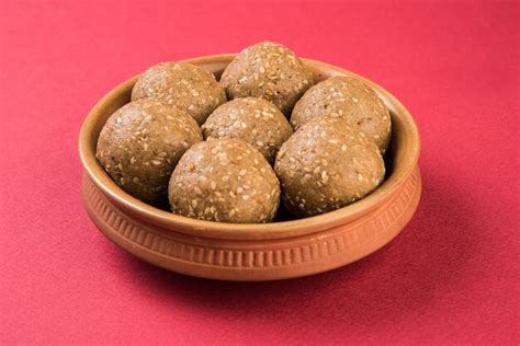 Premium Photo Pile Of Handmade Tilgul Laddu Or Til Gul Laddoo Made Up