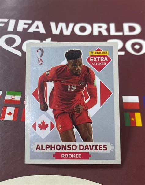 Alphonso Davies Figurinha Extra Sticker Prata Rookie Roupa Esportiva