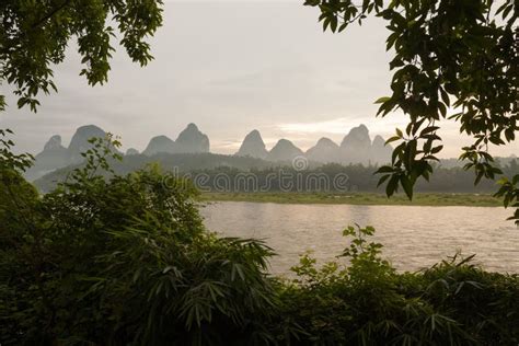 Sunrise Over Karst Mountain and River Li in Yangshuo China Stock Photo - Image of clouds, asia ...