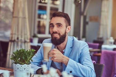 Premium Photo Close Up Portrait Of A Fashionable Bearded Male With A