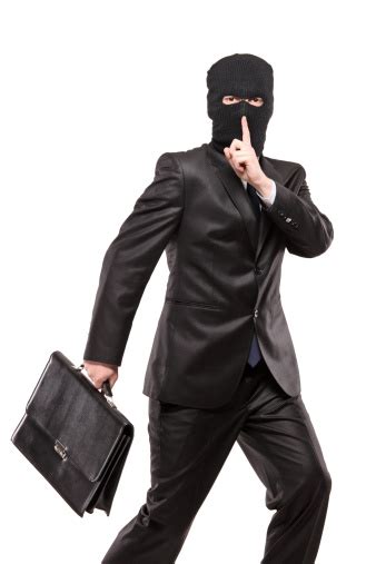 Man In Robbery Mask Stealing A Briefcase Stock Photo Download Image