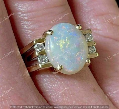 Ct Oval Cut Lab Created Fire Opal Women S Ring K Yellow Gold