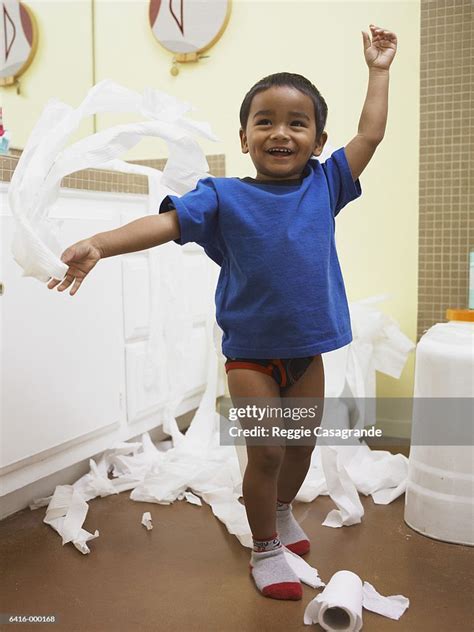 Boy Throwing Toilet Paper High Res Stock Photo Getty Images