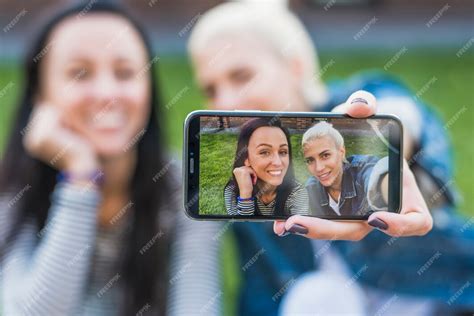 Free Photo Two Happy Women Taking Selfie On Mobile Phone