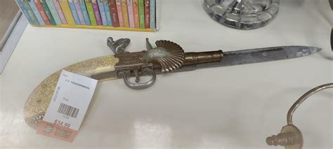 pistol/knife combo... is this worth anything? : SWORDS