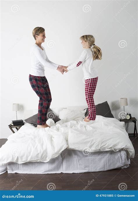 Mother And Daughter Jumping Stock Image Image Of Human Humor 47931885