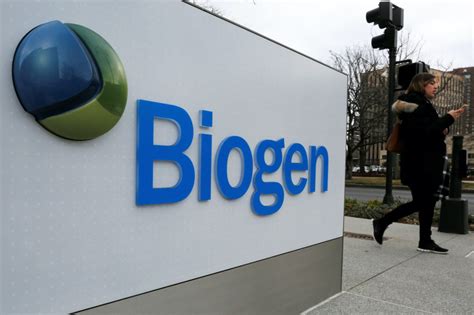 Biogen cuts the price tag on its Alzheimer’s drug in half | PBS NewsHour