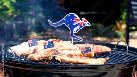 Iconic Australian Bbq Close Up Of Man Cooking Chops Sausgaes And Steak