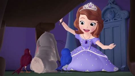 The Princess Is Sitting On The Floor In Her Purple Dress