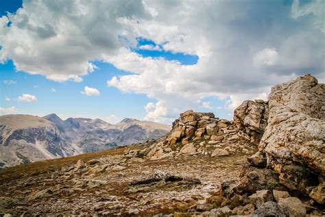 a dry mountainous landscape with rock outcroppings, dry rocky landscape