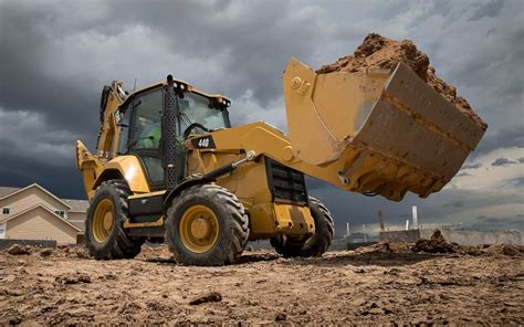 About Backhoe Loaders And Their Functions Latest Heavy Construction