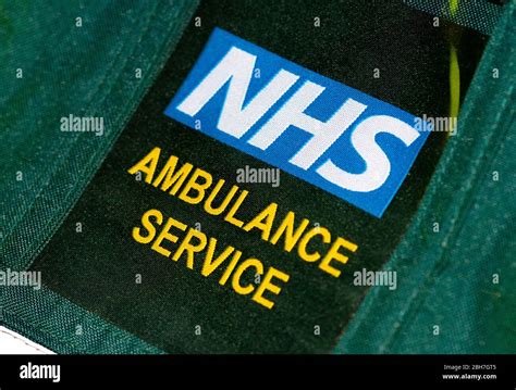 Close Up Angled View Of A British Paramedic Badge On Uniform Jacket