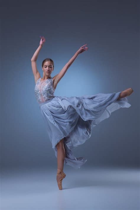 The Beautiful Ballerina Dancing In Blue Long Dress Stock Photo Image