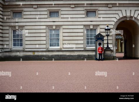 The Iconic Queens Guard At Buckingham Palace And The Tower Of London