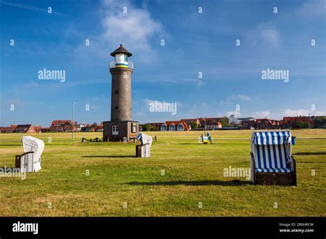 Lighthouse And Beach Chairs Juist Island Nationalpark North Sea