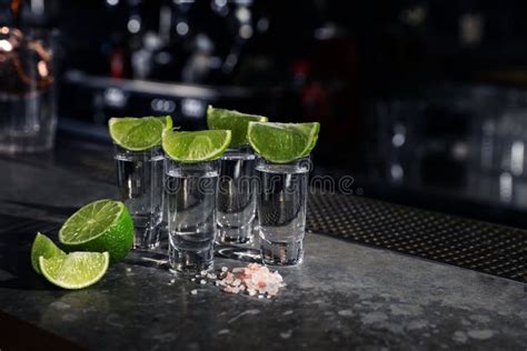 Mexican Tequila Shots Lime Slices And Salt On Counter Stock Image