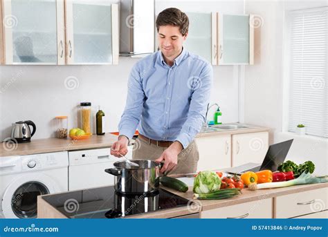 Man Cooking Food In Kitchen Stock Photo Image Of Fresh Lunch 57413846