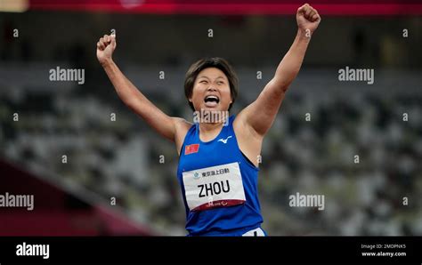 China S Zhou Xia Celebrate Beside The Board After The Women S 200m T35