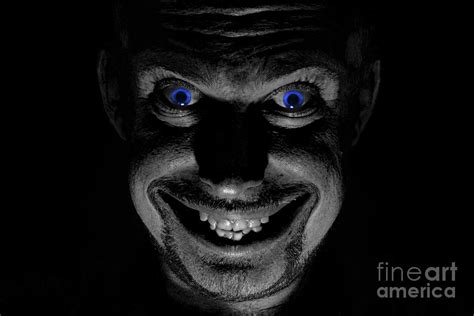 Blue Eyed Demon Photograph By Guy Viner