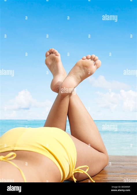 Low Section Of Woman In Bikini At Beach Stock Photo Alamy