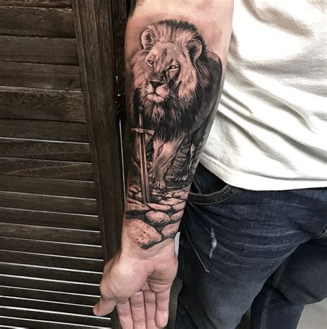 Lion Forearm Sleeve Tattoo