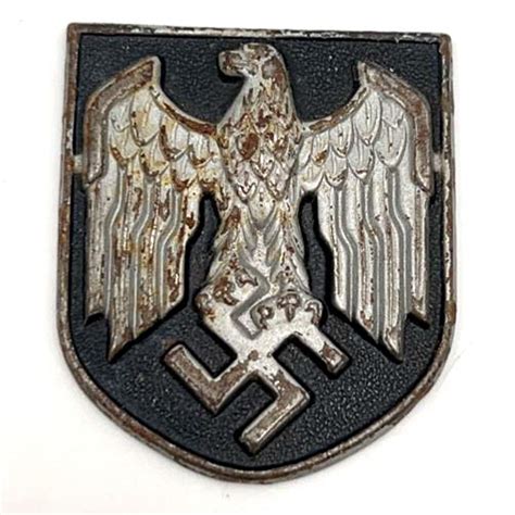 At Auction: GERMAN WWII NAZI BADGE