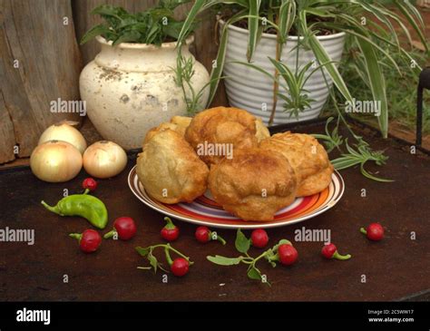 Vetkoek - traditional South African dish (fried bread Stock Photo - Alamy