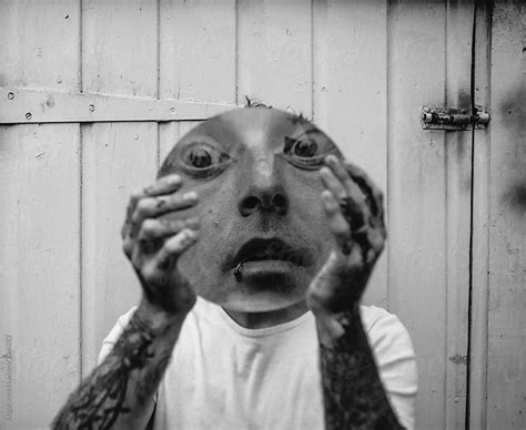 Distorted face caused by an analogue lens. by kkgas - Stocksy United