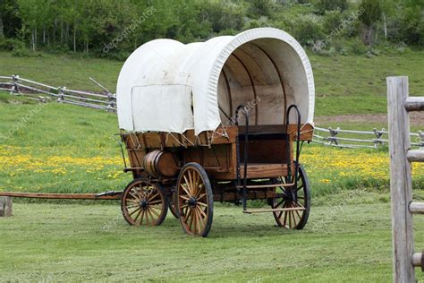 Old covered wagon Stock Photo by ©goodynewshoes 9076101