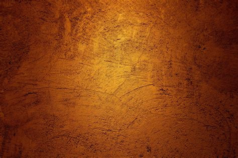 Golden brown plaster wall texture background with scratch and crack ...