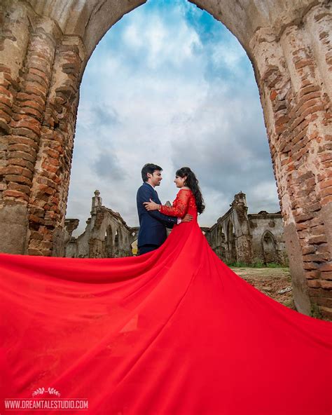 Photo Of A Couple Poses For An Outdoor Pre Wedding Shoot