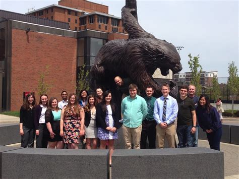 The Group posing with the Bearcat after the poster session this spring