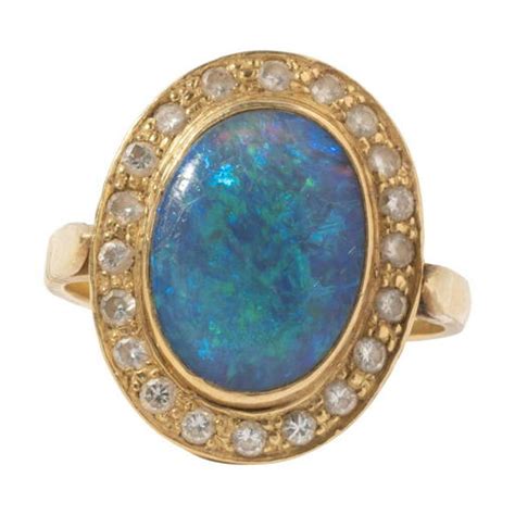 Opal, Diamond, 18k Yellow Gold Ring.