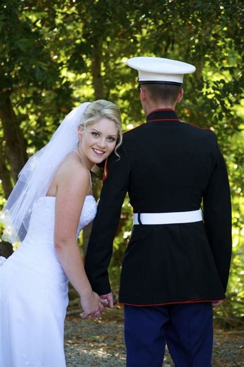 Marine wedding . Marine corps. Dress blues . Bride looking back holding hands Wedding Picture ...