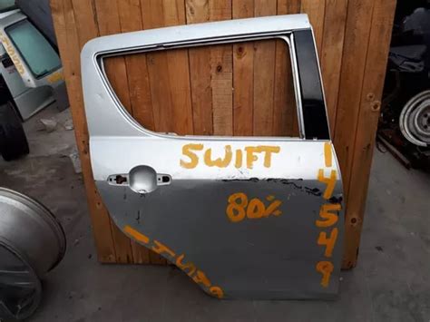 Puerta Trasera Derecha Suzuki Swift Con Detalle 14549 MercadoLibre