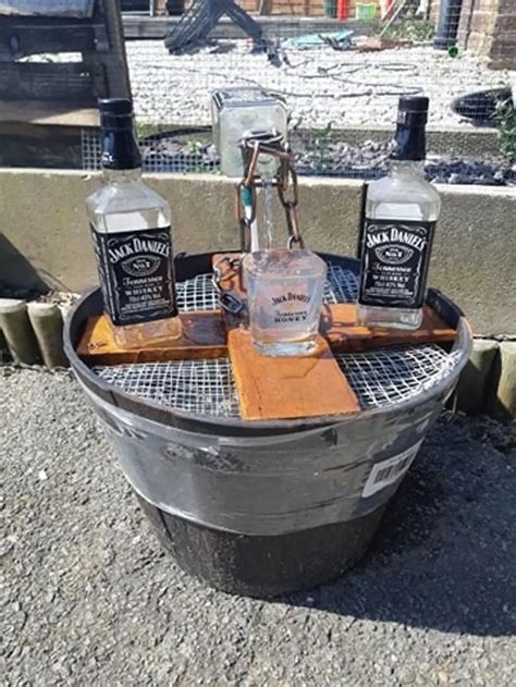 People Are Making Water Features Out Of Their Old Booze Bottles Tyla