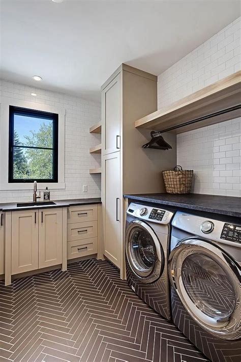 Picture Of An Elegant Modern Farmhouse Mudroom Laundry With Tan Shaker