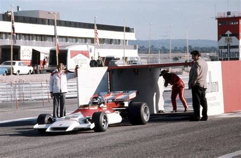 Just A Car Guy: Marlboro F1 car emerging from a mock-up of a giant Marlboro cigarette pack in 1972