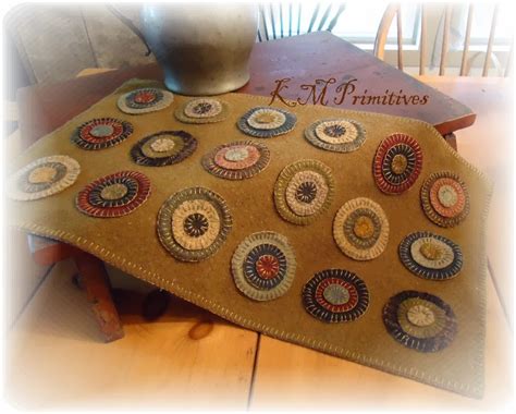 KM PRIMITIVES PENNY RUGS