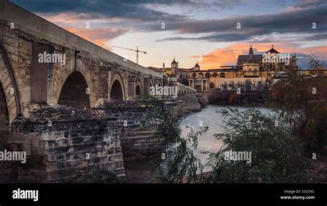 Roman Bridge and Mosque Cathedral of Cordoba Spain Stock Photo - Alamy