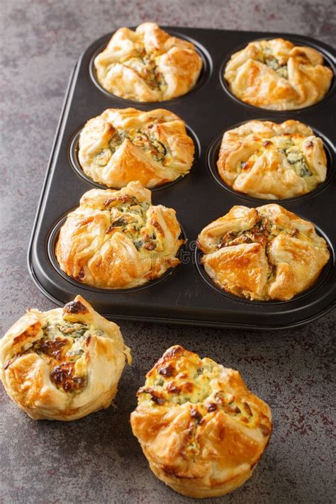 Puff Pastry Muffins Stuffed With Spinach And Feta Cheese Close Up In A