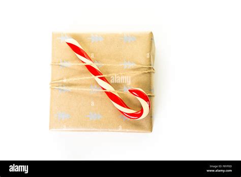 Christmas Gifts Wrapped In Brown Paper With Red Ribbons Stock Photo Alamy